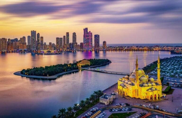 Sharjah,City,Skyline,At,Sunset,&,Sharjah,Lighting,Festival