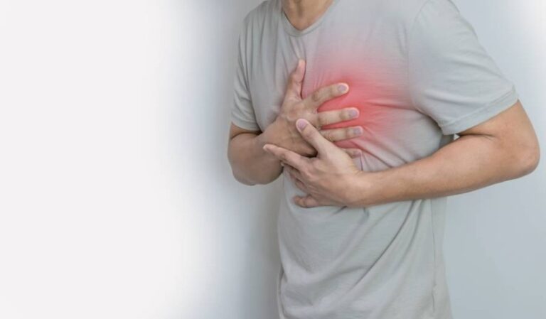 Hands,Holding,Chest,With,Symptom,Heart,Attack,Disease