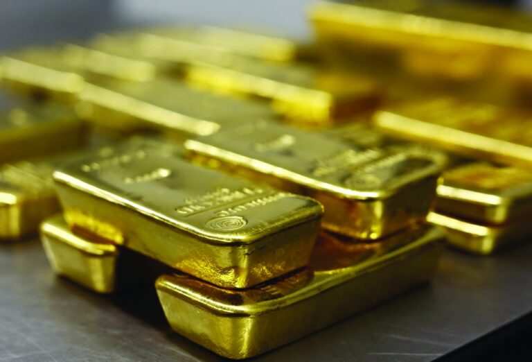 Gold bars are stacked in safe deposit boxes room of the ProAurum gold house in Munich