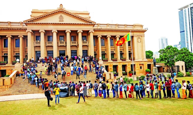 Demonstrators enter the Presidential Secretariat and President's House after Sri Lanka's President Rajapaksa fled, in Colombo