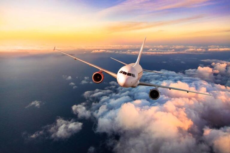Passengers,Commercial,Airplane,Flying,Above,Clouds,,Front,View.,Concept,Of