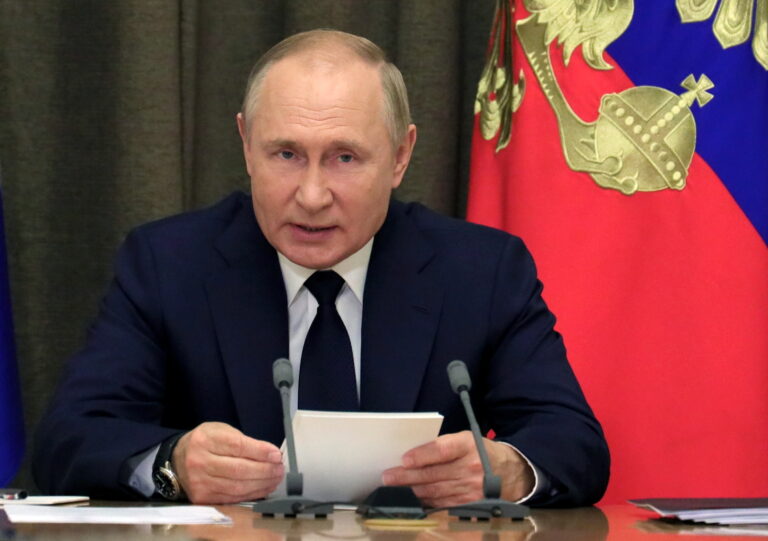 Russian President Vladimir Putin chairs a meeting in Sochi