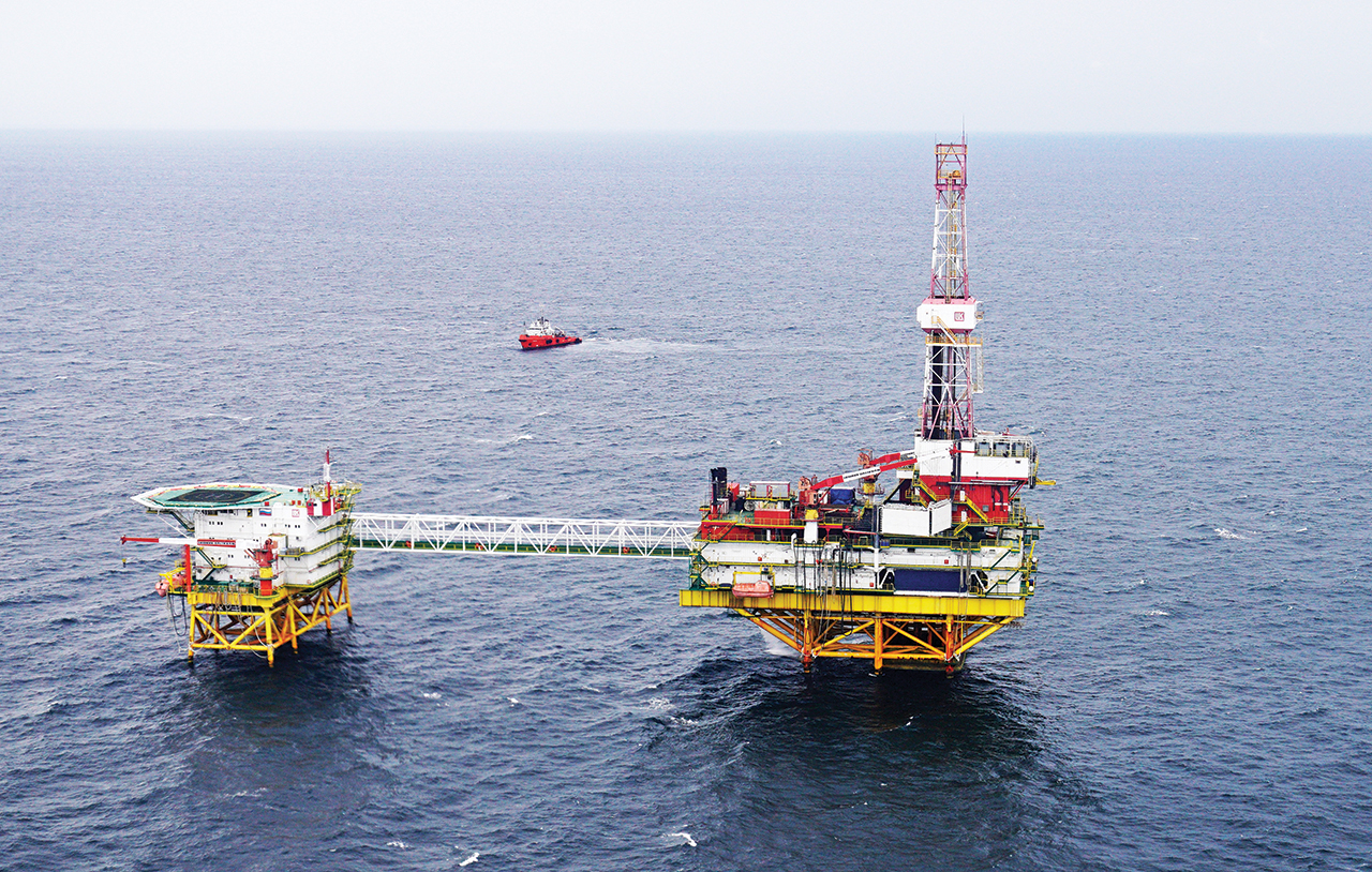 Employees of an oil platform in the Baltic Sea take part in the early voting for the parliamentary election