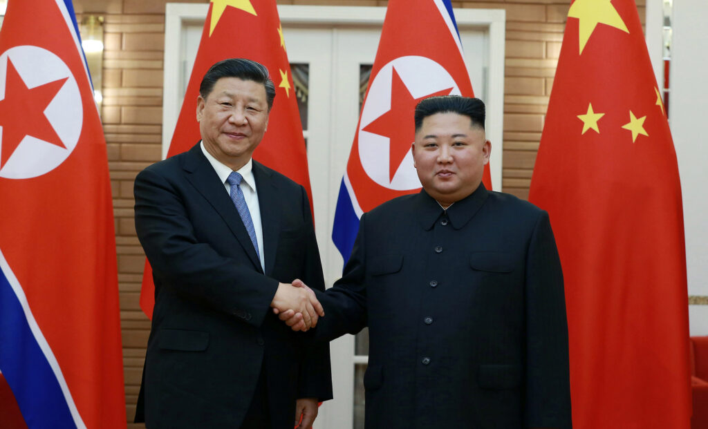 North Korean leader Kim Jong Un shakes hands with China's President Xi Jinping during Xi's visit in Pyongyang, North Korea in this undated photo released on June 21, 2019 by North Korea's Korean Central News Agency (KCNA)