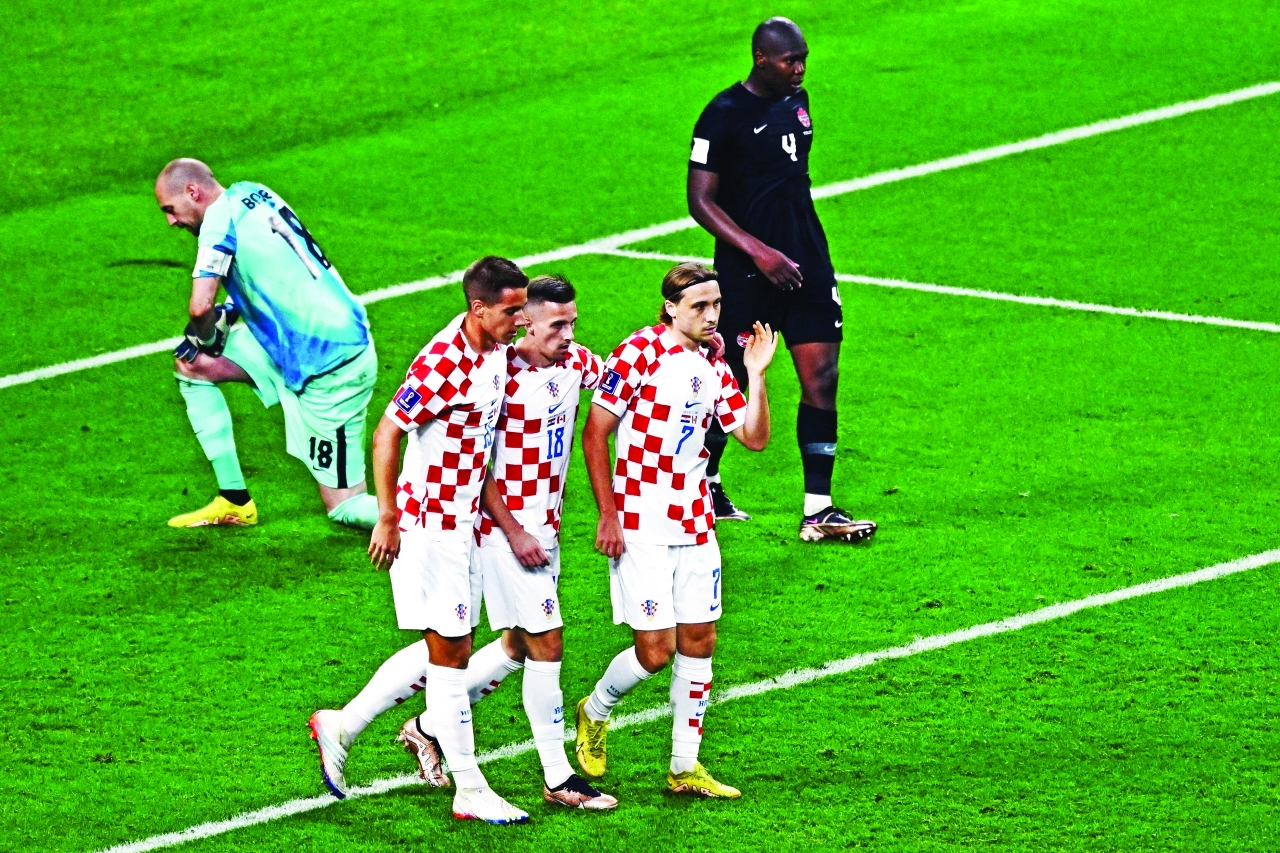 TOPSHOT-FBL-WC-2022-MATCH27-CRO-CAN