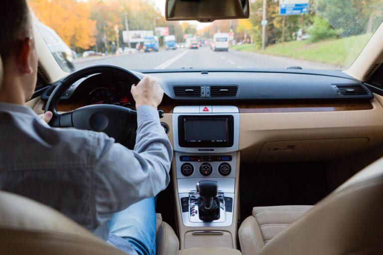 The man driving the modern car. Concept, road trips and travel,