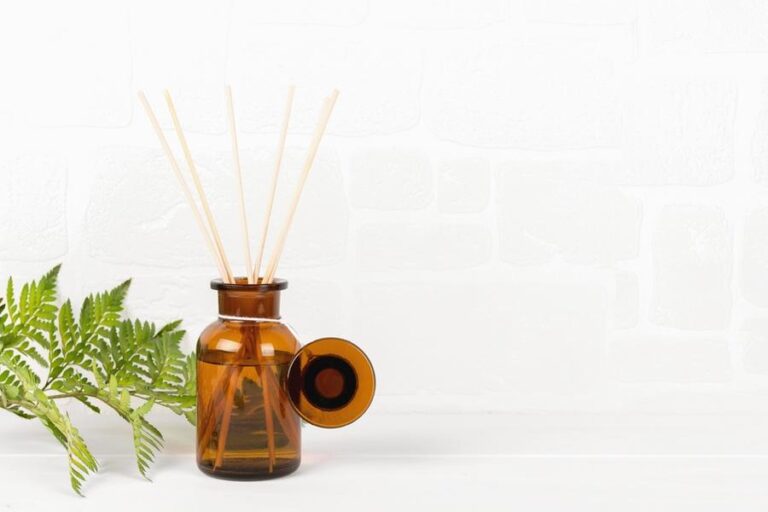 Air,Refresher,Bottle,Mock,Up,,Reed,Diffuser,On,A,White