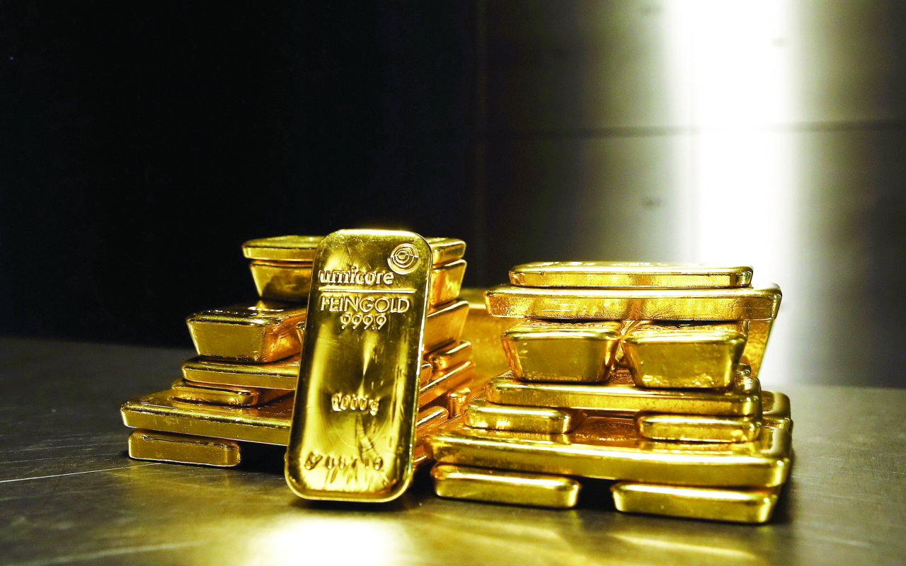 Gold bars are stacked in safe deposit boxes room of the ProAurum gold house in Munich