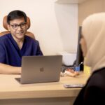 Dr. Partha Sarathi Das, Medical Director and Consultant in Reproductive Endocrinology and Infertility at Orchid Fertility, during a consultation with a patient.jpg